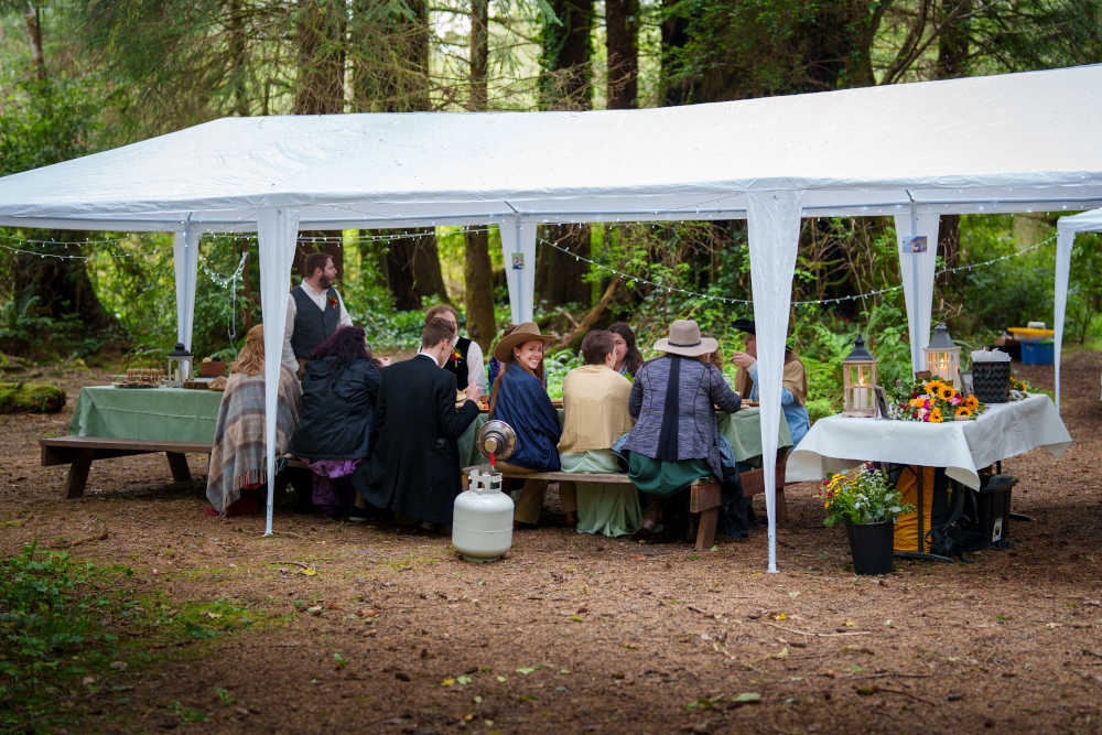 Simple outdoors wedding reception setup at the campground.